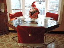 a dining room table with a santa sleigh on it