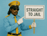 a man in a police uniform holds a sign that says straight to jail