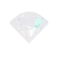 a diamond with a green glow in the center