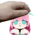 a pixel art of a girl with pink hair and blue eyes being pummeled by a hand .