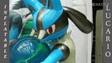 a blue and black pokemon is playing with a ball .