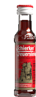 a bottle of schierker feuerstein has a red label and a white cap