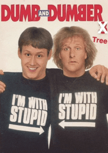 two men wearing shirts that say i 'm with stupid and dumb and dumber