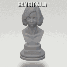 a statue of a woman with the name gambit zula above it