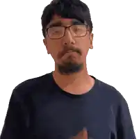a man with glasses and a beard is making a funny face