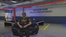 a police officer standing in front of a mission row police department car