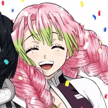 a close up of a girl with pink hair and green highlights smiling .