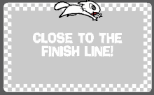 a close to the finish line sign with a checkered background