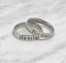 a couple of rings that say fucking ladylike