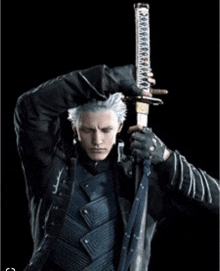 a man with white hair is holding a sword in his hands