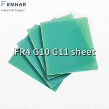 a stack of green sheets with the words fr4 g10 g11 sheet on top