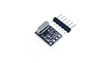 a small blue electronic device with a chip and a bunch of connectors