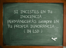 a chalkboard with spanish writing on it