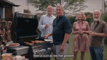 a group of people standing in front of a grill with the words denn ja auch du bist hier gemeint on the bottom