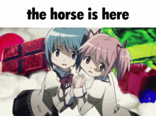 a picture of two anime girls with the words the horse is here below them