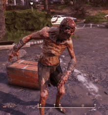 a zombie in a video game is standing next to a box that says ' n. '