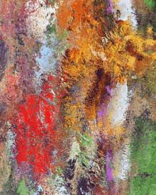 a close up of a colorful painting with a few spots of red