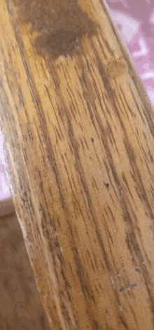 a close up of a piece of wood shows the grain