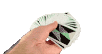 a hand is holding a fan of playing cards with a triangle design