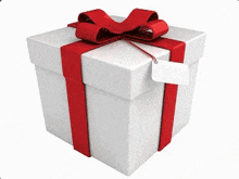 a white gift box with a red ribbon and a tag