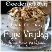 a cup of hot chocolate with chocolate sauce on top and the words ` ` fijne vrijdag ` ` written on it .