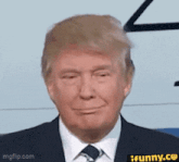 donald trump is wearing a suit and tie and making a funny face .