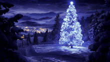 a christmas tree is lit up in the snow