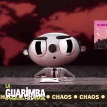 a cartoon character sits at a desk in front of a sign that says la guarimba