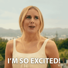 a woman says " i 'm so excited " in front of a netflix logo