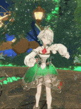 a girl in a green dress is dancing in front of a street light