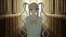 a girl with a bow in her hair is standing in a dark hallway
