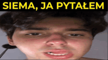 a close up of a young man 's face with the words siema ja pytalem above it