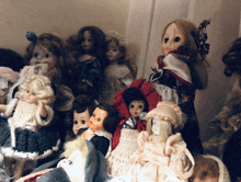 a group of dolls are sitting on a table