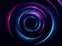 a blue and purple circle with a black center on a dark background