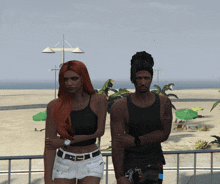 a man and a woman standing next to each other on the beach