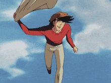 a man in a red sweater and brown hat is flying in the air