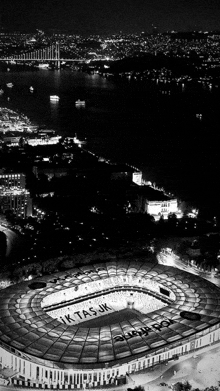 a black and white photo of a stadium that says jk tasjk on it