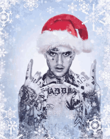 a tattooed man wearing a santa hat with the word daddy written on his chest