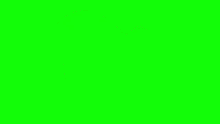 a close up of a man 's face with a green background .