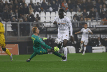 a soccer player wearing a white jersey that says inter sport on it