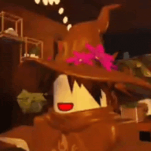 a close up of a cartoon character wearing a witch hat with a pink flower on it .