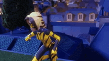 a cartoon character in a yellow and black superhero costume is standing on a roof .