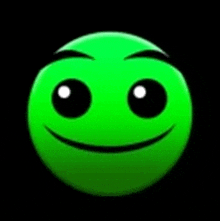 a green smiley face with black eyes and a smile on it .