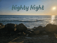 a picture of a rocky beach with the words nighty night above it