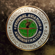 the washington air route federal aviation administration traffic control center coin