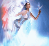 a painting of a woman with wings and a butterfly in her hand