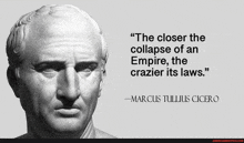 a statue of a man with a quote from marcus tullius cicero