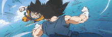 goku and vegeta are fighting each other in a cartoon in a blue sky .