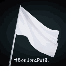 a white flag with the words #benderaputih written below it