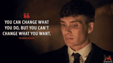 a man in a suit and tie with a quote by thomas shelby